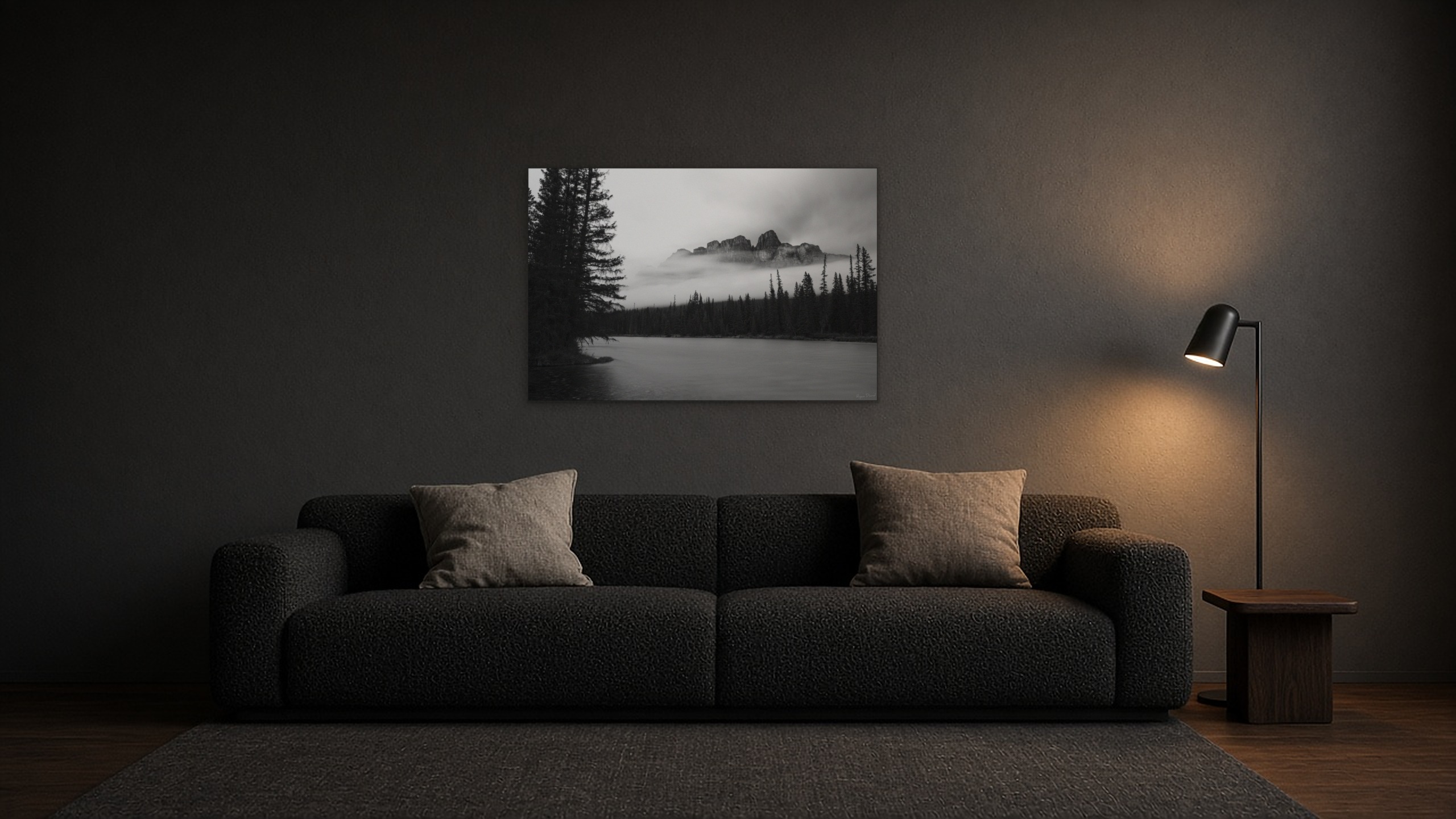 Castle in the Clouds as a 20 x 30 inch metal print centred above a black sofa in a charcoal living room.